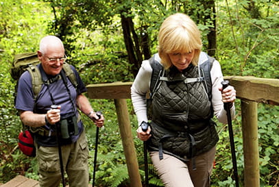 Mature Caucasian couple on a hiking trail